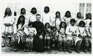 Father Girard and Inuit children of Cathechism class/| Prime Girard, Inuit, classe de catéchisme