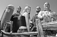 Bertrand Caron photographié en 2004 avec trois de ses enfants, Jérôme, Langis et Marilène