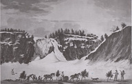 Vue des chutes Montmorency en hiver à partir du chemin tracé sur la glace passant devant celles-ci