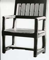 Fauteuil rustique chanfreiné avec dossier à fuseaux