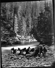 Portage of canoes at Upper Gate Murchison's Rapids, B.C., 1871